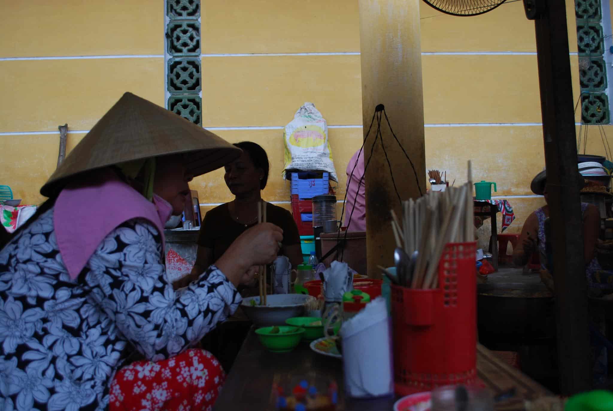 A cao lau noodle stall in the Hoi An market