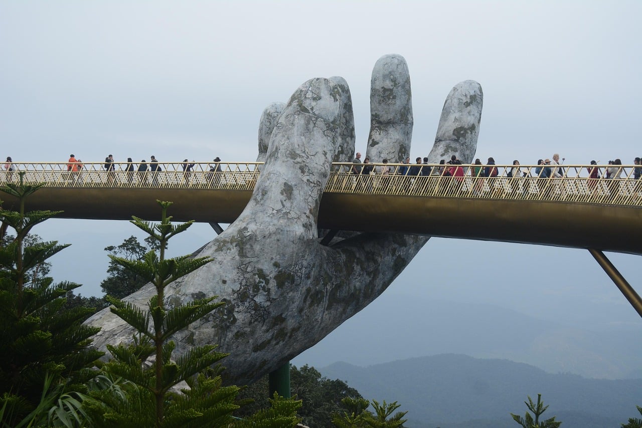 Close-up of the giant stone hands holding the Golden Bridge