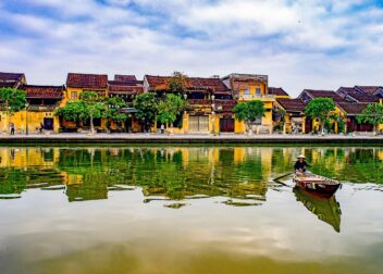 Hoi An old town reflected in the Thu Bon River, Vietnam