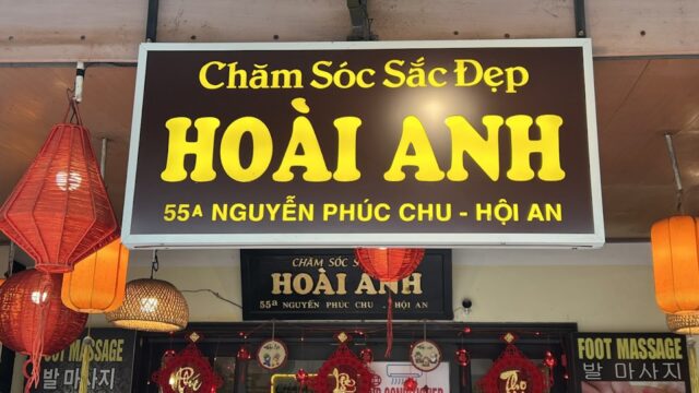 A Vietnamese beauty care shop sign reads Spa Hoai Anh - Chăm Sóc Sắc Đẹp HOÀI ANH, 55A Nguyễn Phúc Chu - Hội An.