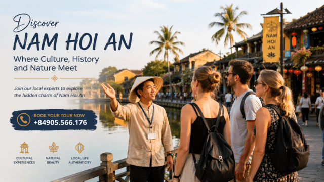 A tour guide gestures while talking to four tourists by a riverside in historic Hoi An at sunset.
