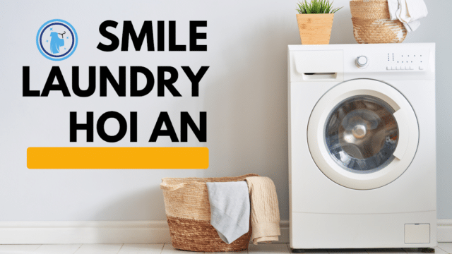 Front-load washing machine, laundry basket with towel, plants, and Smile Laundry Hoi An text with a bear logo bring comfort to Hoi An.